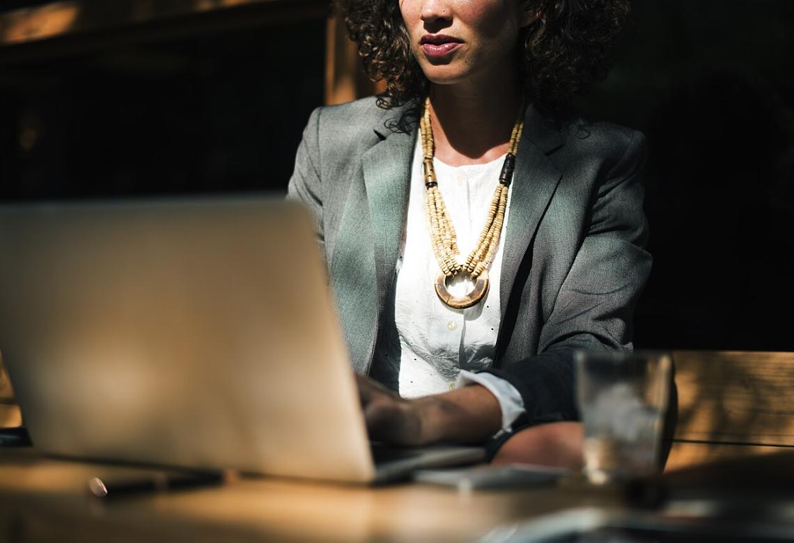 Businesswoman working at table